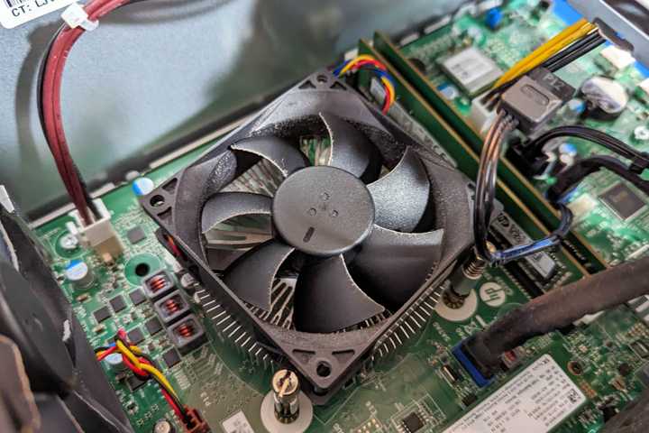 Dusty cooling fans inside a PC tower