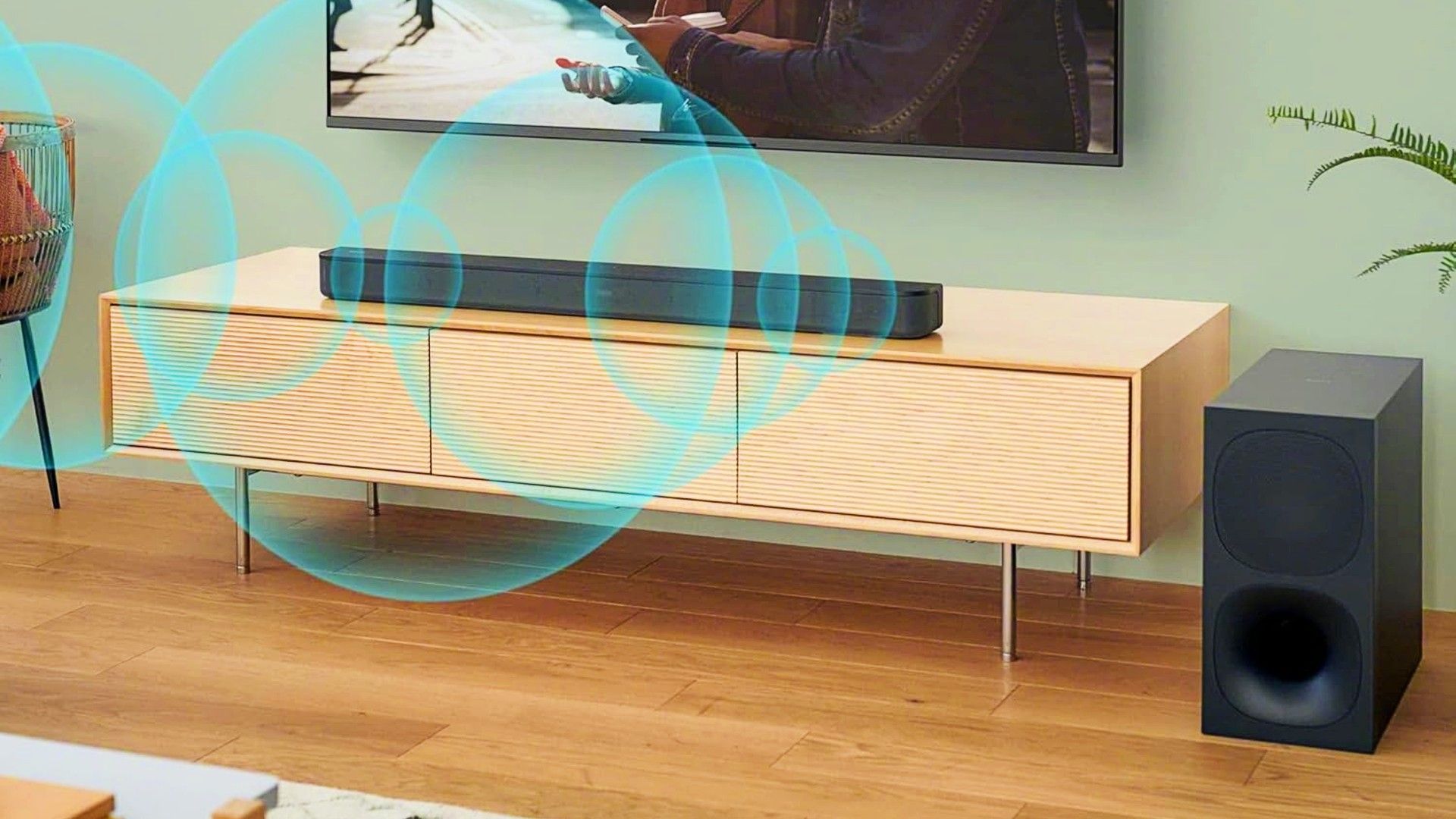 A Sony HT-S400 soundbar shooting blue audio out from under a TV