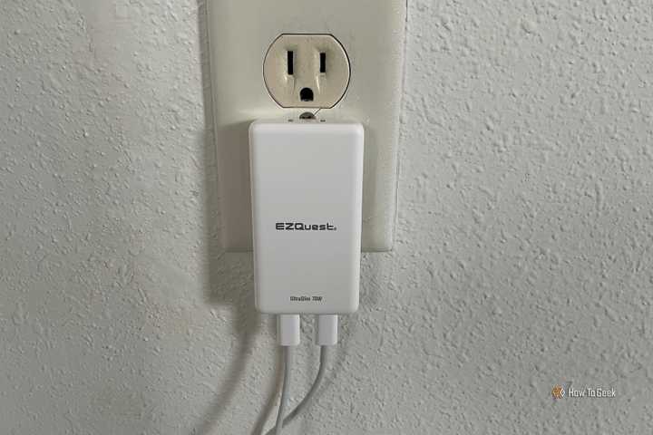 The EZQuest UltraSlim 70W Wall Charger plugged into an AC outlet.