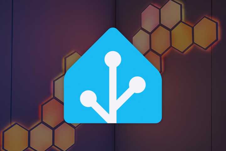 The Home Assistant logo with Octocon RGB LED lights on the wall in the background