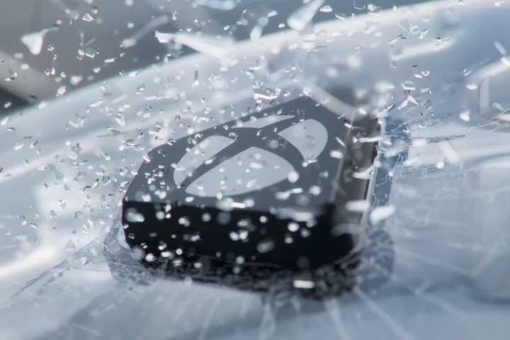Xbox button smashing through glass in the ROG Xbox Ally reveal.