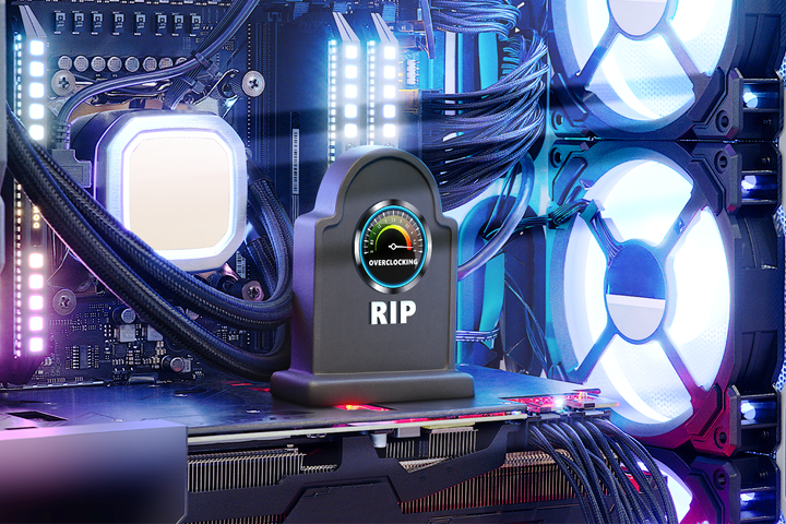 A gaming PC with glowing lights, featuring a small tombstone placed on the GPU that reads 'RIP' with an Overclocking gauge.
