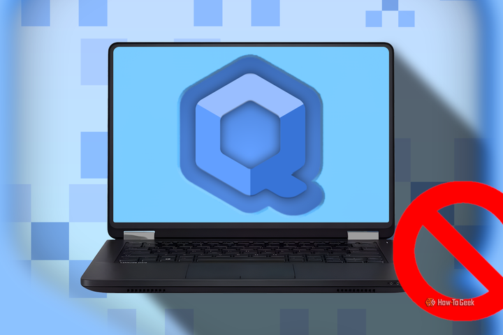 A laptop displaying the Qubes OS logo, with a background of abstract cube patterns in shades of blue. In the bottom right corner is a red, no-entry sign.