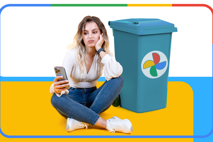Frustrated woman sitting on the floor looking at her phone, next to a blue trash bin with the Google Photos logo, against a colorful background inspired by Google's colors.